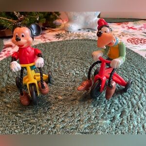 VINTAGE MICKEY&GOOFEY ON TRIKES. WALT DISNEY PROD ON THE BACK.